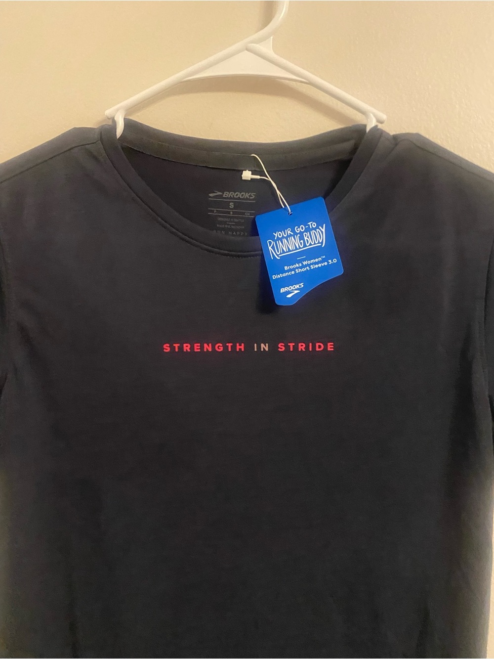 Brooks women’s  Black Short-Sleeve Tee - "Strength in Stride"